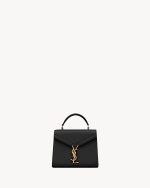 YSL CASSANDRA Mini top handle bag in grain de poudre embossed leather